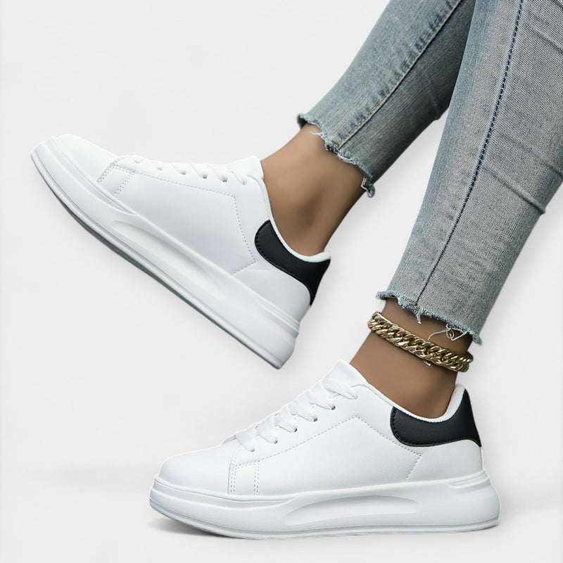 Eva Eleganti Minimalistiset Kaupunkijuoksukengät" could be rewritten as "Eva Eleganti Minimalist Urban Running Shoes.