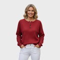 Helle | Vafli-neulepaita napilla" can be rewritten as "Helle | Button-Up Waffle Knit Sweater.